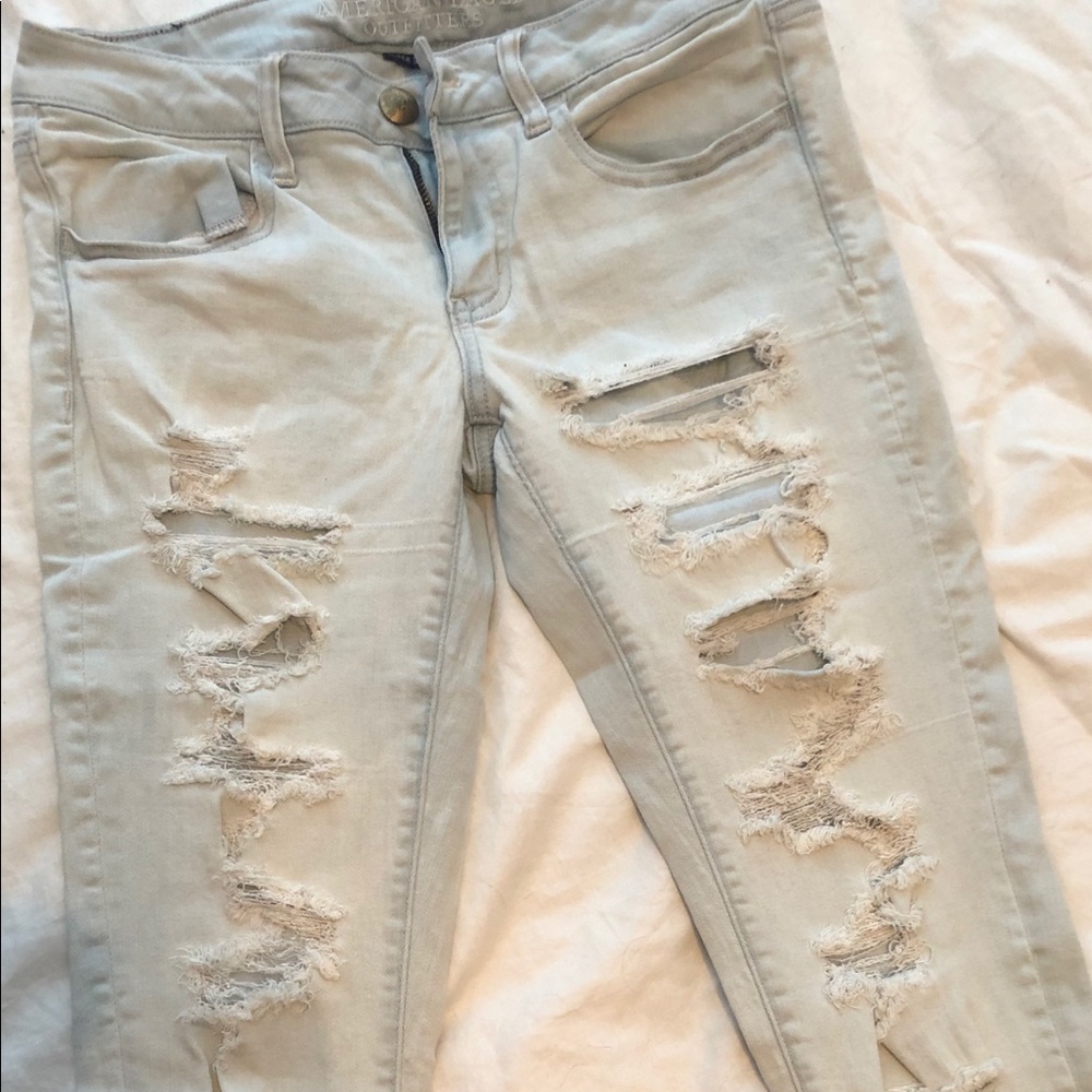 Light wash distressed jeans